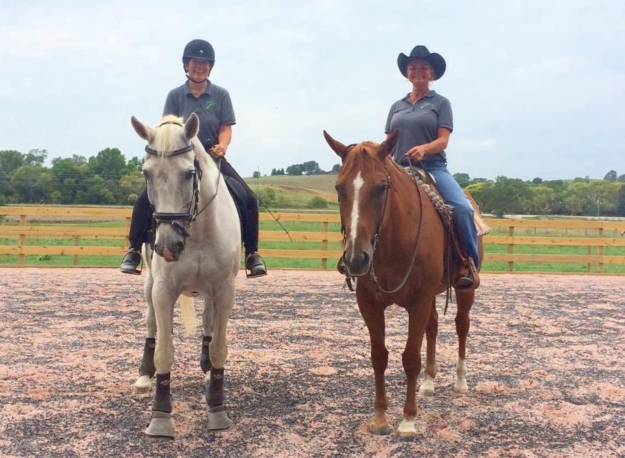 Prairie Rose Equestrian Center Operations Manger Cathy Perley and Horse Manager Jenny Linton on horses.